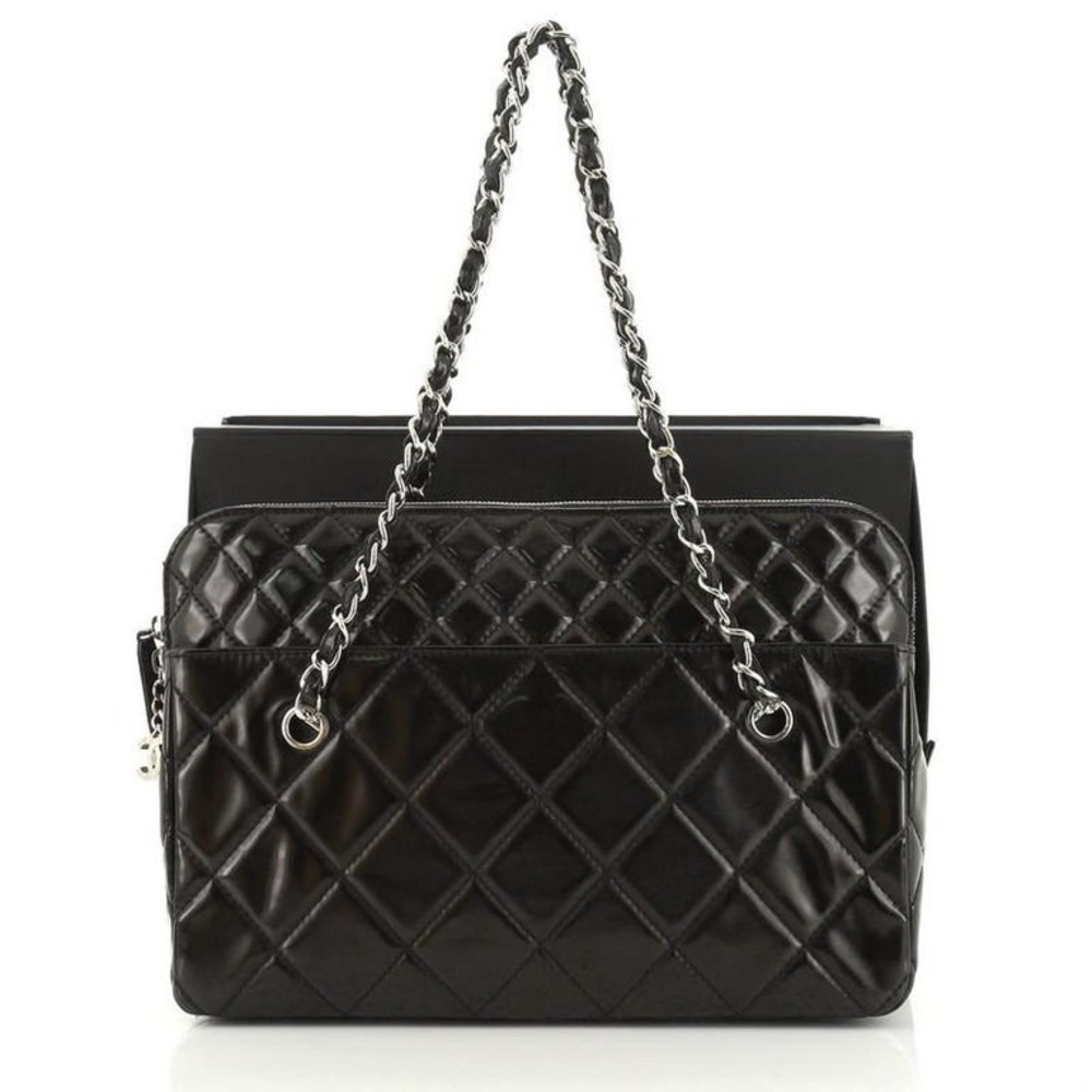 CHANEL IN THE BUSINESS BAG